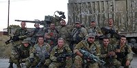 Обмен пленными в Луганске превратился в перестрелку, перестрелка — в настоящую войну. Специальный репортаж о тех, кто видит цели — но не смысл